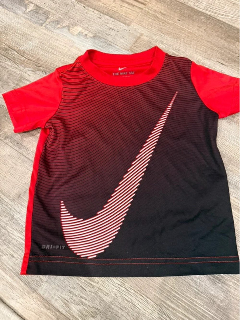 Nike kids red/black Dri-Fit tee with white  large Nike swoosh   0008 SKU